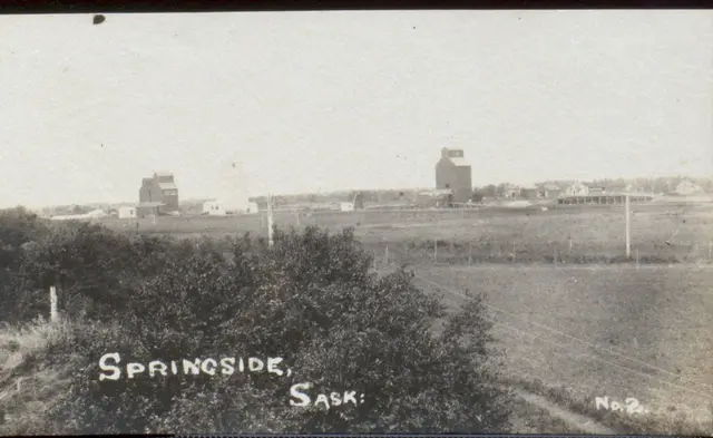 View of Springside with grain elevators